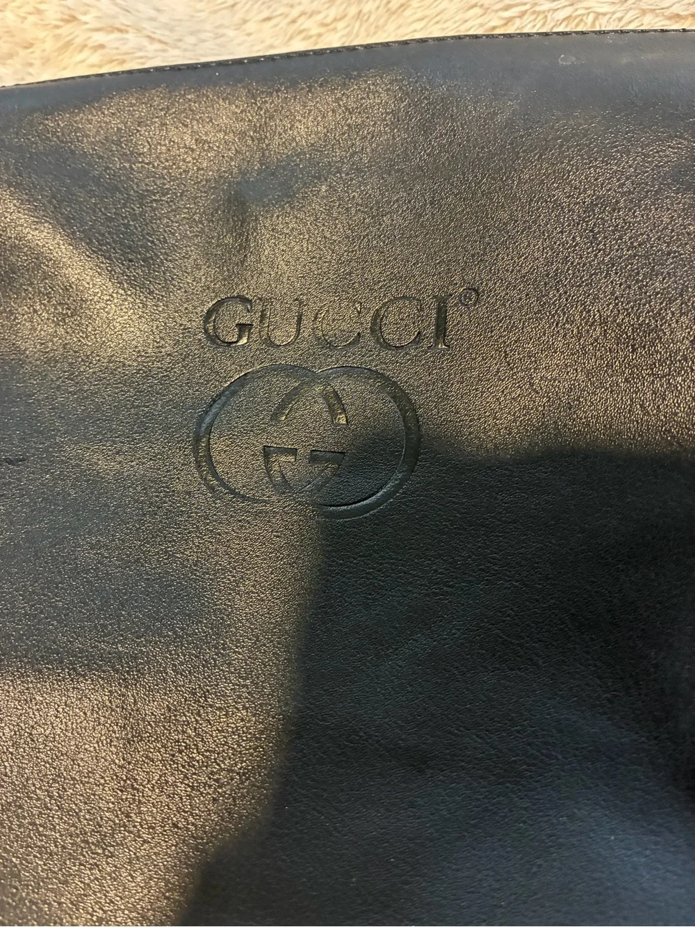 Black Leather Pouch - Men's Travel & Toiletry Bag with Gucci Logo front